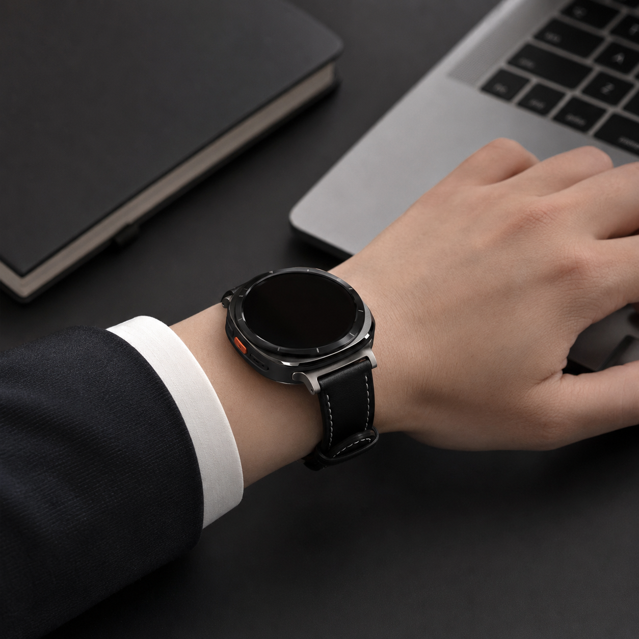 Black Avontic HeritageFrame band on a circular rugged 47mm smartwatch at an executive workspace