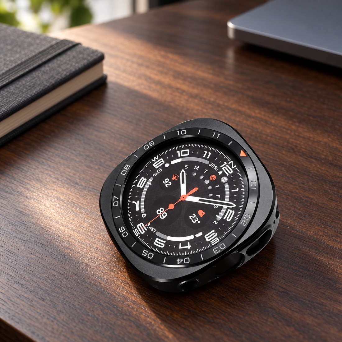 Aegis Contour alloy watch case styled at a walnut desk; watch and band sold separately